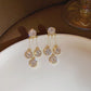 🎁💥BUY 1 GET 1 FREE💥🎁2025 New Zircon Round Petal Earrings